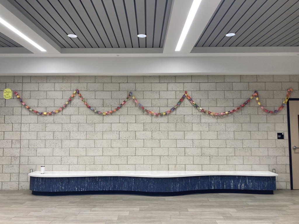 The chain is hanging on several walls in the gym atrium